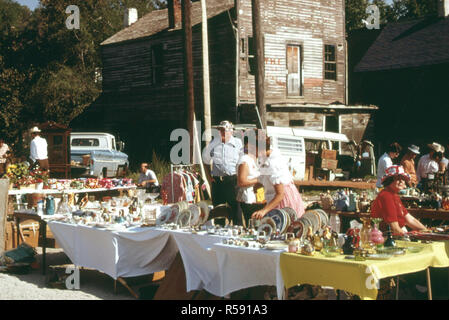 Flea Market Dealers Await Customers at White Cloud Kansas near Troy, in the Northeast Corner of the State...09/1974 Stock Photo