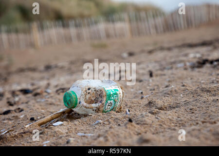 Crosby, Merseyside. 30th Nov 2018. UK Weather. UK Storm Diana beach debris on the shoreline. The inevitable assortment of plastic debris washed up by the tide and deposited on the famous beach near Liverpool. Crosby beach is known as a Another Place and is the site of an iron men installation of 100 figures by the artist Antony Gormley. Credit: MediaWorldImages/AlamyLiveNews. Stock Photo