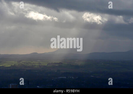 Cave Hill Country Park, Belfast, Northern Ireland. 30 November 2018. Uk weather - a mixed day with sunshine, heavy downpours and strong winds. View from Cave Hill over Belfast to the distant County Down countryside.. Credit: David Hunter/Alamy Live News. Stock Photo