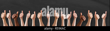 Row Of Hands Showing Thumb Up Sign Stock Photo