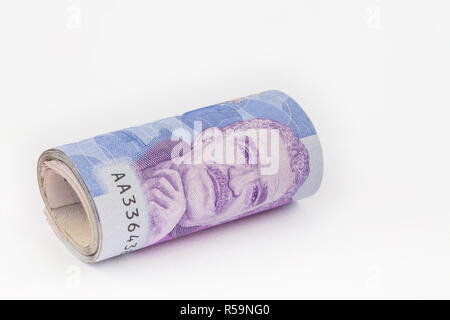 Roll of Fifty Thousand Colombian Pesos Bills Stock Photo
