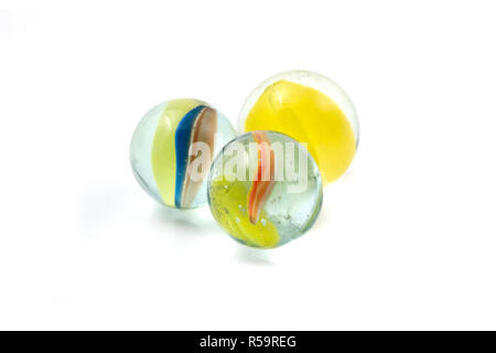 Glass catseye marbles on a white background Stock Photo