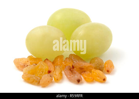 Sultanas grapes and raisins on a white background Stock Photo
