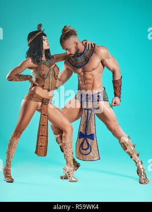 The man, woman in the images of Egyptian Pharaoh and Cleopatra Stock Photo