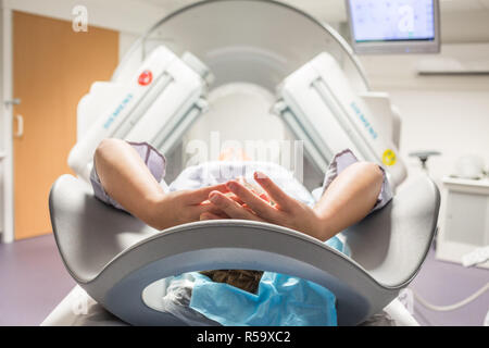 Scintigraphy of heart using a gamma camera coupled to a scanner, France. Stock Photo