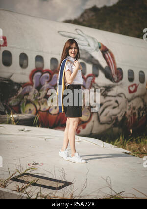 portriat of beautiful asian younger woman  wearing university uniform Stock Photo