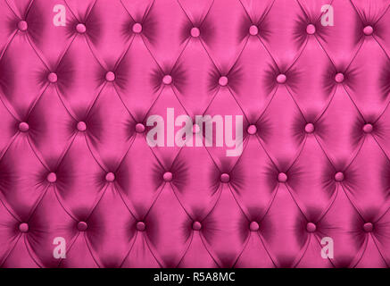 Pink capitone tufted fabric upholstery texture Stock Photo