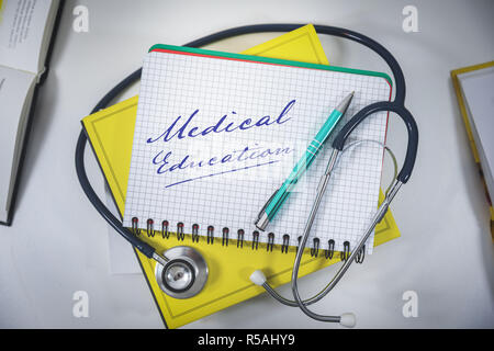 Table of medical student with books and stethoscope Stock Photo - Alamy