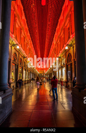 Red illimunated Royal Galleries of St Hubert in Bruxelles Stock Photo