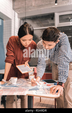 Active hard-working businessmen working together in the morning Stock Photo