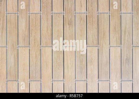 Walls and building tiles. The texture of the tiles. The colors of ceramic tiles with a touch of wood. Different shades. Stock Photo