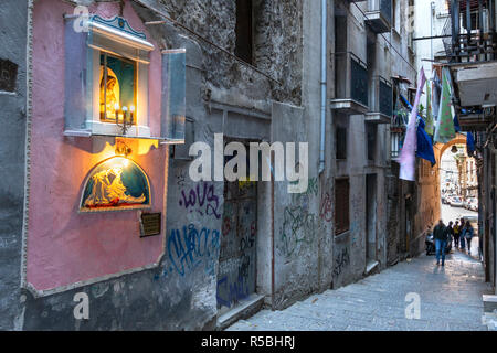 A typical family shrine found in many streets in Naples like this one in the Pendino Santa Barbara, leading up to the Centro Storico, the  historical  Stock Photo
