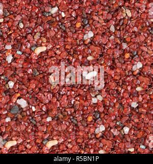Red stones texture. Seamless square texture. Tile ready. Stock Photo