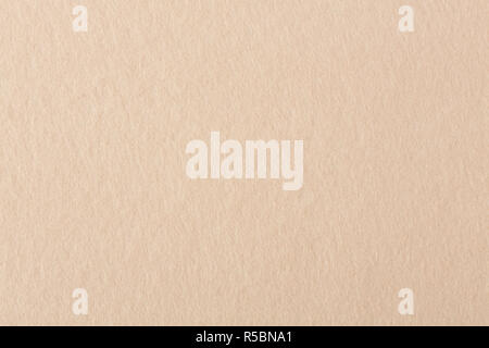 Natural high quality biege felt texture on macro. Stock Photo