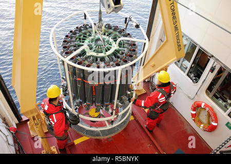 Deploying A CTD Rosette from the CCGS Amundsen during a scientific expedition by ArcticNet and ATLAS scientists Stock Photo