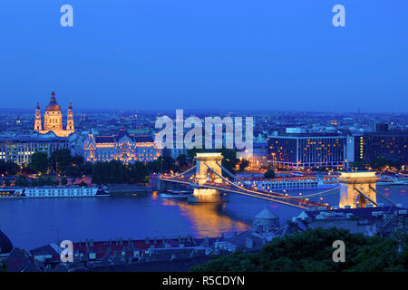 Chain Bridge, Four Seasons Hotel, Gresham Palace and St Stephen's Basilica at Dusk, Budapest, Hungary, Stock Photo