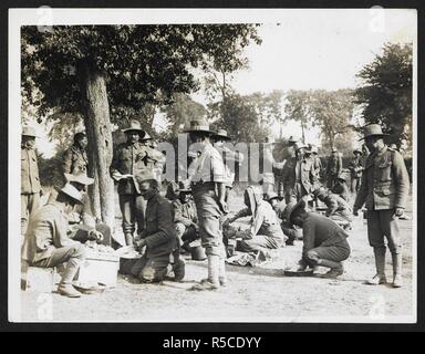 Gurkhas preparing & cooking food [St Floris, France]. Men of the 9th Gurkhas preparing food in the open air, 23rd July 1915. Record of the Indian Army in Europe during the First World War. 20th century, 23rd July 1915. Gelatin silver prints. Source: Photo 24/(66). Author: Girdwood, H. D. Stock Photo