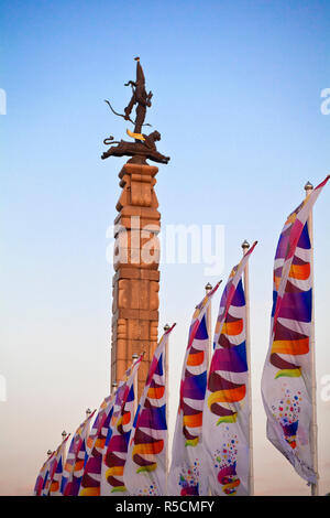 Kazakhstan, Almaty, Respublika Alangy Soviet created ceremonial sqaure, Monument to Independence, stone column surmounted with a replica Golden man standing on a winged snow leopard Stock Photo