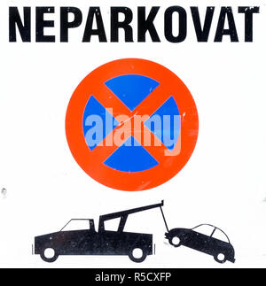 Czechian No Parking sign, cutout, showing a car being towed by a truck Stock Photo