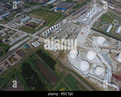 Oil refinery plant for primary and deep oil refining. Equipment and tanks in the oil refinery. Rectification and vacuum equipment. Stock Photo