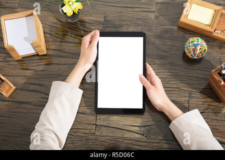 Businessperson Holding Blank Digital Tablet Stock Photo