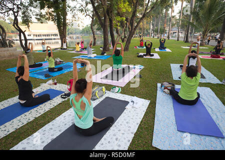 Thailand, Bangkok, People Practicing Yoga in Lumphini Park Stock Photo