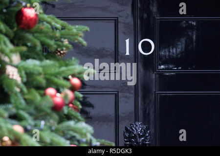 Downing Street, London, UK. 1st December 2018. A giant spruce Christmas tree with decorations is installed in front of the Prime Minister's Residence at 10 Downing Street London. Prime Minister Theresa May has threatened  to 'cancel Christmas' for Brexit if she loses the meaningful vote on 11 December and Brexit Deal Agreement is voted down. Credit: amer ghazzal/Alamy Live News