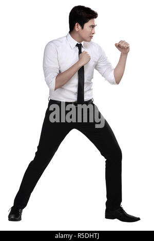 Young businessman in defensive pose afraid of something isolated on ...