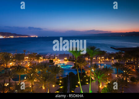 Jordan, Aqaba, elevated view of the Red Sea and hotel swimming pool Stock Photo