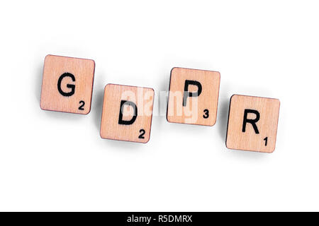London, UK - July 8th 2018: The abbreviation GDPR - General Data Protection Regulation, spelt with wooden letter tiles over a plain white background. Stock Photo