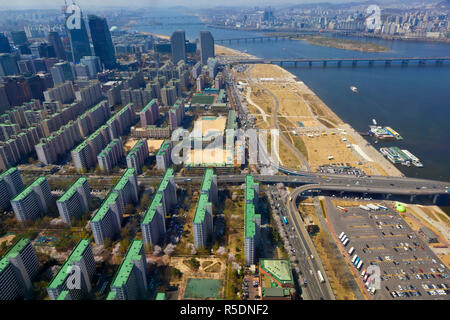 Korea, Seoul, Yeouido, View of Yeouido appartment buildings and Hangang river and Hangang riverside park from 63 Building Stock Photo