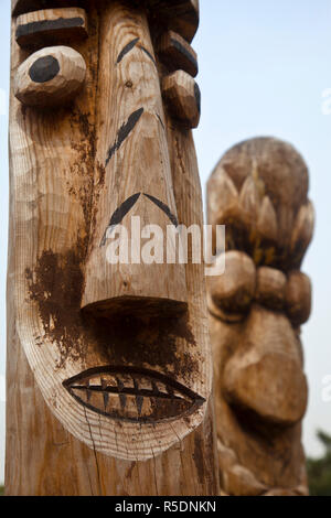 Korea, Seoul, Gyeongbokgung Palace, National Folk museum of Korea, Jangseung, carved wooden posts used to scare away evil spirits from villages Stock Photo
