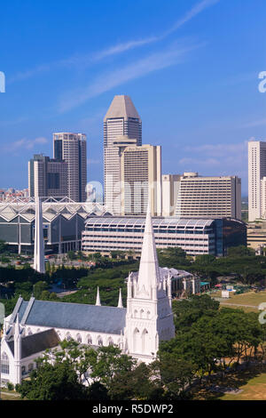 St. Andrews Anglican cathedral and modern city skyline, Singapore, South East Asia Stock Photo