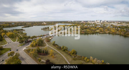 Aerial panoramic view of Wascana Lake during a vibrant day in the Fall Season. Taken in Regina, Saskatchewan, Canada. Stock Photo