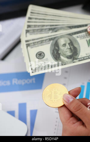 businessmen change currency make successful deal hold money in arms Stock Photo