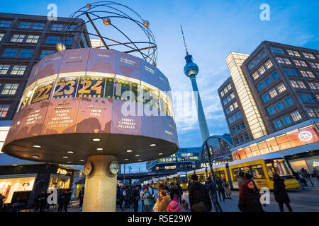 Evening view of World Clock and Television Tower, or Fernsehturm, at Alexanderplatz , Mitte, in Berlin , Germany Stock Photo