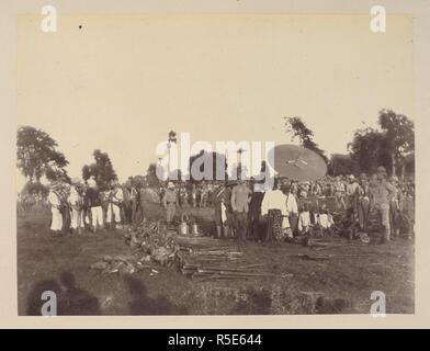 Nominal surrender of the Burmese army at Ava on 27th November, 1885. 'Burmah. A series of one hundred photographs illustrating incidents connected with the British Expeditionary Force to that country, from the embarkation at Madras, 1st Nov, 1885, to the capture of King Theebaw...'. 27 Nov. 1885. Photograph. Source: Photo 312/(16). Author: Willoughby Wallace Hooper. Stock Photo