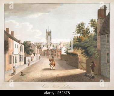 View looking down Corve Street, Ludlow; St Lawrence's Church in the distance; a horse and rider in the centre of the street; houses, figures and trees on either side  . Corve Street, Ludlow. London : Published May 20th 1812 by R. Lambe, Fleet Street., [May 20 1812]. Aquatint and etching with hand-colouring. Source: Maps K.Top.36.15.a. Language: English. Stock Photo