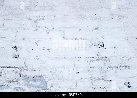 An old white wall. White brick wall. Stock Photo