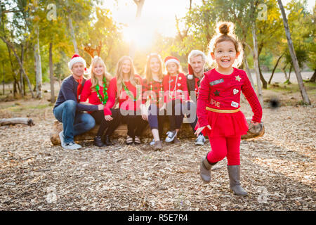 Christmas Themed Multiethnic Family Portrait Outdoors. Stock Photo