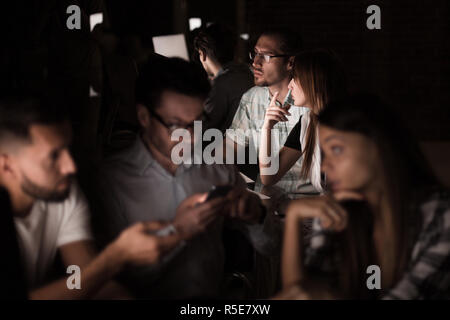 business team uses gadgets to get the information they need Stock Photo