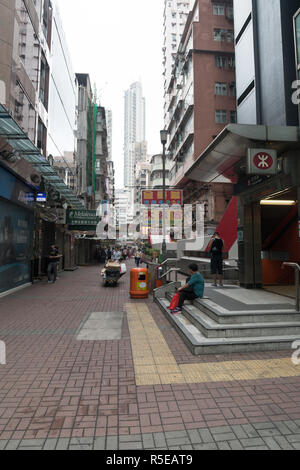 KOWLOON, HONG KONG - APRIL 21, 2017:  Entrance to Mong Kok Underground Station in Kowloon, Hong Kong. Stock Photo