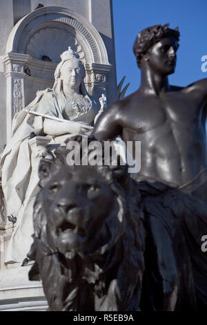 Victoria Memorial. The immense marble statue  of Queen Victoria, by Thomas Brock, is located in front of Buckingham Palace in The Mall, London, UK. Stock Photo