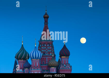 Russia, Moscow, Red Square, Kremlin, St. Basils Cathedral with moonrise Stock Photo