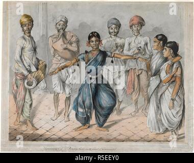Dancing girls and musicians. c.1800. Dancing girls and musicians from Madras. A girl in the costume of a temple dancer is concentrating on her movements in the centre of the drawing. She is accompanied by a drummer to her left and a bagpiper and two hand cymbal players behind her, while two other girls on the right wait to join in, one of whom may be the teacher beating time with her foot. Pencil pen-and-ink and watercolour. British school.  Originally published/produced in c.1800. . Source: WD 4510,. Author: CHRISTOPHER GREEN. Stock Photo