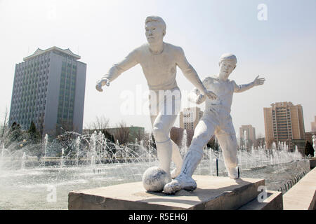 Democratic Peoples's Republic of Korea (DPRK), North Korea, Pyongyang fountains in front of the Pyongyang Indoor Stadium Stock Photo