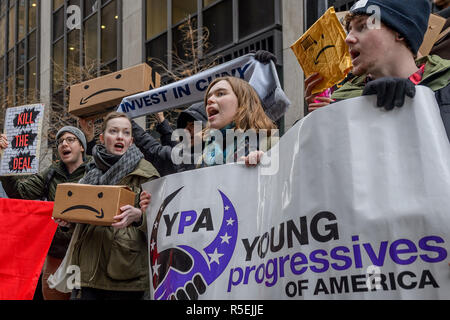 New York, United States. 30th Nov, 2018. CUNY students, staff and allies held a rally outside Siebert Cisneros Shank & Co. in downtown Manhattan, protesting CUNY's Board Board of Trustees chair Bill Thompson for endorsing the Amazon HQ2 deal. The students called on Bill Thompson to withdraw his support for the Amazon deal immediately and instead advocate for the investment of the $2.7 billion promised to the company to be invested in the CUNY university system and its students. Credit: Erik McGregor/Pacific Press/Alamy Live News Stock Photo