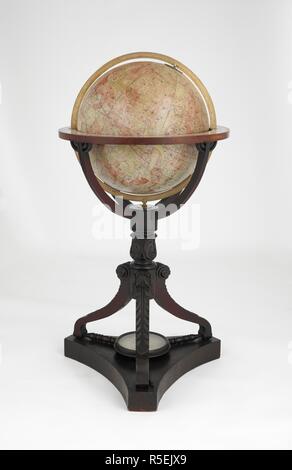 Celestial Globe on a stand. Malby's Celestial Globe, collated from the works of Piazzi, Bradley, Hevelius, Mayer, la Caille, and Johnson. Reduced to the year 1860, by Jno Addison. Engraved by Chas. Malby. London : Malby & Son, for Society for Diffusion of Useful Knowledge, 1869. In very poor condition. Stand in pieces. Globe badly cracked with surface damage. Cork ring support provided to prevent globe rolling around. Forms a pair with Malby's terrestrial globe at Maps G.31.   Includes compass in base of stand.   Physical Description: 1 globe ; col., mounted on a cork ring ; 46 cm. in diam.; S Stock Photo