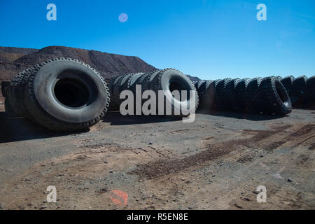 Huge new tires are waiting for use by the haulers at the Super Pit goldmine in Kalgoorlie, Australia. Stock Photo