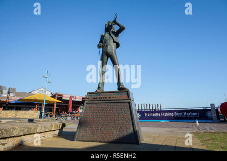 The Bon Scott, former lead singer of AC/DC sits at the harborside area of Freemantle, Western Australia. Stock Photo